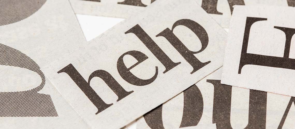 high-angle-newspaper-pieces